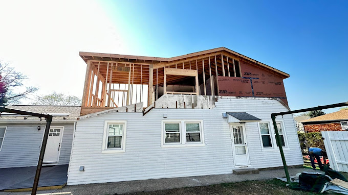 A house being built in the middle of the day