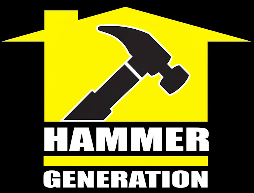 A hammer and a hammer on top of a house